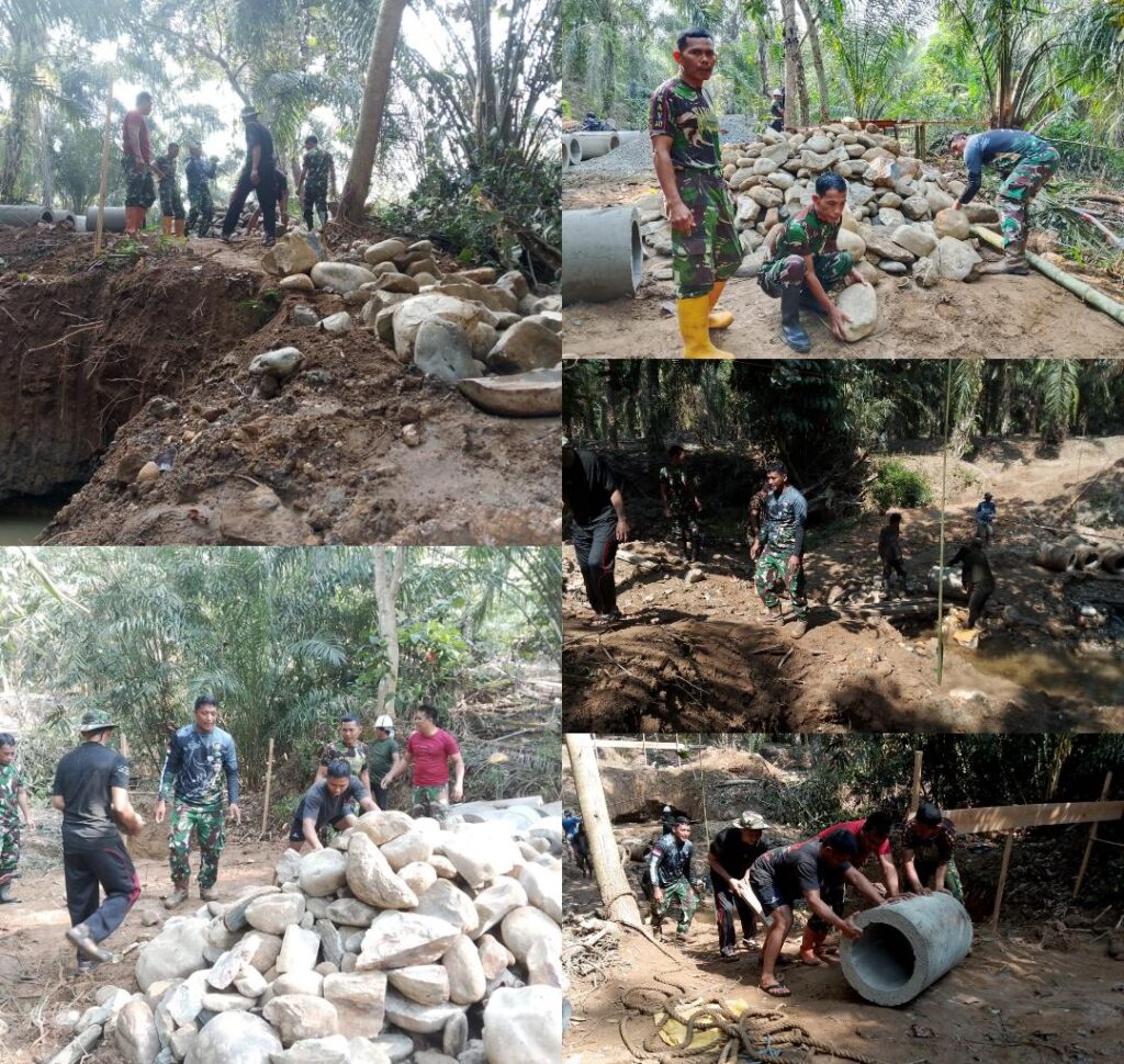 Personel Koramil Mangkutana bersama warga gotong royong membangun jembatan di Desa Pancakarsa