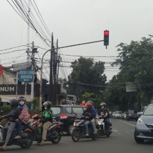 Lalu lintas perkotaan sebagai ilustrasi regulasi transportasi berbasis aplikasi